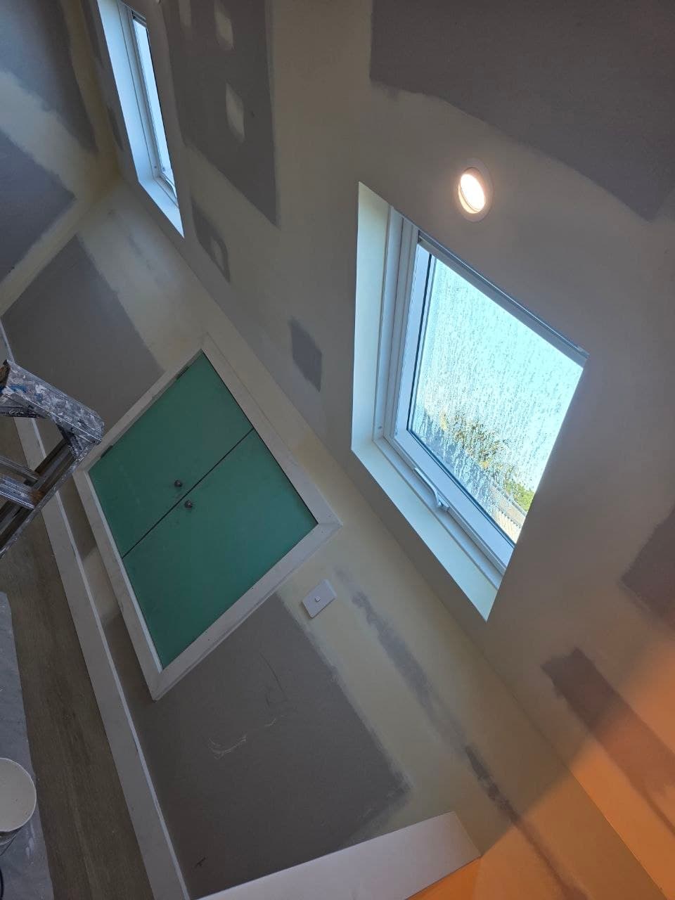 Attic wall and cupboard before painting